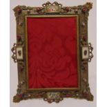 A 19th century French rectangular photograph frame decorated with jewels and vignettes, 19 x 15cm