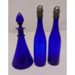Three Bristol blue glass decanters, two with cast metal tops, tallest 34cm (h)