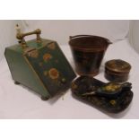 A quantity of Victorian tole ware decorated with flowers and leaves to include a coal scuttle, a