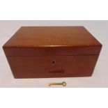 An early 20th century rectangular mahogany humidor, hinged cover to include key and cigars, 11 x