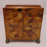 A Regency rectangular jewellery casket with marquetry sides and hinged cover, the hinged doors