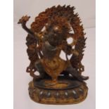 A Tibetan bronze figurine of Buddha on raised lotus oval base, 24 x 18cm