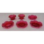 A quantity of cranberry glass to include two bowls and four dishes