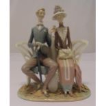 Lladro figural group of a gentleman and lady seated on a bench, marks to the base, 30 x 26cm