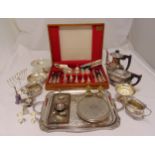 A quantity of silver plate to include a tea set, dishes, a tray and a cased canteen