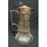 A Victorian hallmarked silver and glass claret jug, the body etched with grapes and vine leaves, the