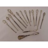 A quantity of hallmarked silver to include twelve button hooks, a shoehorn and a nail file