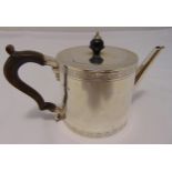 A Victorian hallmarked silver drum teapot, cylindrical with engraved bands the flat hinged cover