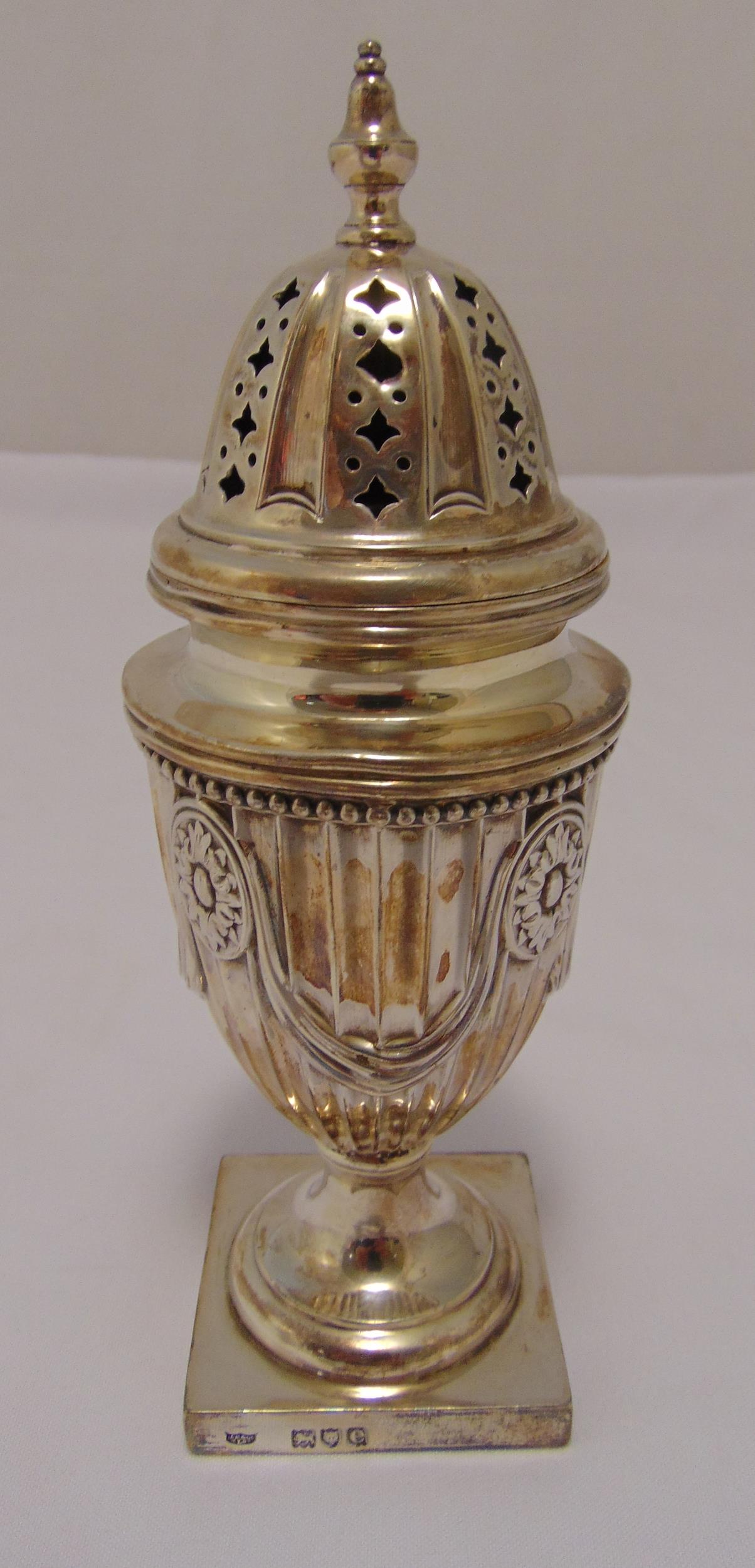 A Victorian hallmarked silver sugar castor, fluted vase form in neo-classical style on square