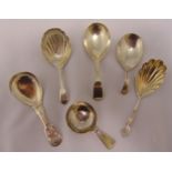 Six hallmarked silver Georgian, Victorian and modern caddy spoons of various shape and form,