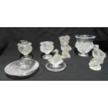 A quantity of Lalique glass to include vases, figurines and a table lighter (7)