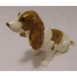 Hutschenreuther figurine of a seated dog, marks to the base, 14cm (h)