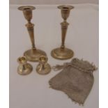 A pair of hallmarked silver table candlesticks, Birmingham 1910, a pair of hallmarked silver dwarf