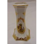 A Meissen taper stick holder of faceted rectangular form decorated with panels of ships on the coast