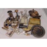 A quantity of silver plate to include entrée dishes and covers, a syphon stand, salvers and