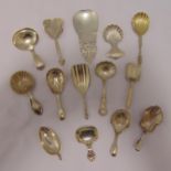 Fourteen silver and white metal caddy spoons of various shape and form, approx total weight 186g