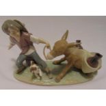 Lladro figural group of a boy with a donkey, marks to the base, 13.5 x 28 x 10cm