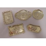 Five hallmarked silver pin trays, various shapes and form, three chased with cherubs, approx total