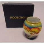 Moorcroft enamel vase decorated with trees in a landscape, 8cm (h) to include original packaging