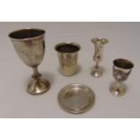 Four silver and white metal Kiddush cups and a coaster, approx total weight 202g