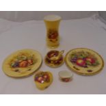 A quantity of Aynsley porcelain to include plates, a vase, a carved heart shaped box, a cup and