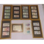 A quantity of framed UK bank notes of various values and eras
