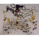 A quantity of costume jewellery to include some silver jewellery, brooches, necklaces and earrings