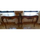 A pair of French shaped rectangular Kingswood tables with marquetry tops and applied gilded metal