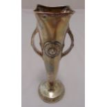 A hallmarked silver vase Liberty style, hand hammered tapering cylindrical with scrolling side