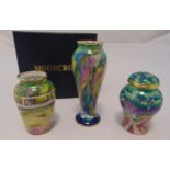 Two Moorcroft miniature enamel vases and a covered vase, decorated with fish, trees and