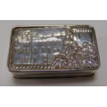 A Victorian hallmarked silver castle top vinaigrette, rounded rectangular, the hinged cover chased