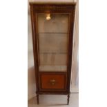 A French style mahogany and Kingswood rectangular glazed display cabinet with gilded metal mounts on
