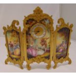 A Viennese style boudoir clock of three sections with polychromatic scenes depicting lovers and