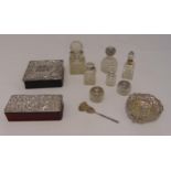 A quantity of hallmarked silver to include two dressing table boxes, a bonbon dish, seven bottles