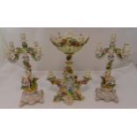 A quantity of 19th century continental porcelain to include a pair of five light candelabra and a