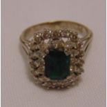 White gold diamond and emerald ring, tested 18ct, approx total weight 6.8g