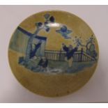 A Chinese crackle glazed dish decorated with figures in a garden, 26cm diameter