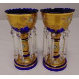 A pair of Bohemian style lustres, blue ground over painted with gold and floral decoration, 25cm (