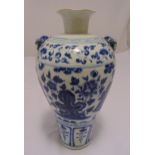 A Chinese blue and white baluster vase decorated with flowers, figures and scrolls, 36cm (h)