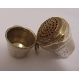 A Victorian silver nutmeg grater of conical form engraved with stylised leaves the hinged cover