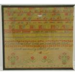 A 19th century framed sampler with letters, numbers and flowers by Margaret Dunne and John