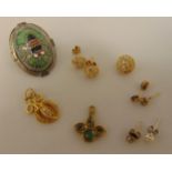 A quantity of costume jewellery to include earrings, pendants and a brooch