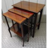 A nest of four mahogany tables with satinwood banding on tapering rectangular legs, 69 x 55 x 37.cm