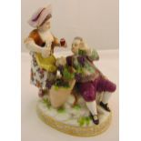 Meissen figural group of a boy and girl holding grapes on a vine, on oval base, marks to the base,