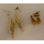 A pair of 9ct gold earrings A/F and another pair set with citrine, approx total weight 3.1g