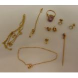 A quantity of 9ct gold jewellery to include chains, bracelets, earrings, a ring and a pin, approx