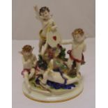 A continental figural group of four putti on raised oval base by Volkstet-Rudolstad circa 1900, 34cm