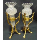 A pair of glass and gilt metal candle holders with cut glass thistle shape bowls, A/F
