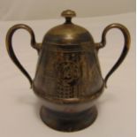 A Russian silver two handled sugar bowl of conical form with two side handles, domed hinged cover on