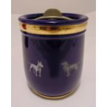 Doulton blue ground tobacco jar and cover of cylindrical form with screw off cover, the sides